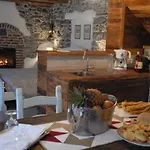 In Pietra E Legno Con Caminetto Inverso Pinasca