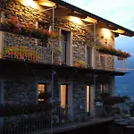 In Pietra E Legno Con Caminetto Inverso Pinasca