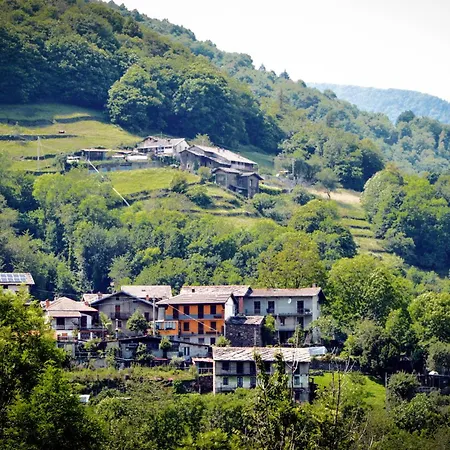 In Pietra E Legno Con Caminetto Inverso Pinasca